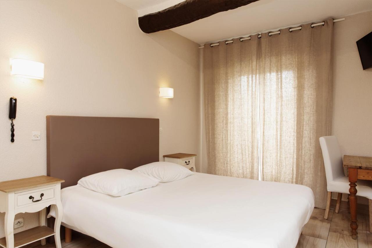 Coq Hotel Cogolin Bagian luar foto