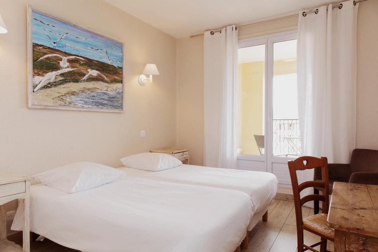 Coq Hotel Cogolin Bagian luar foto