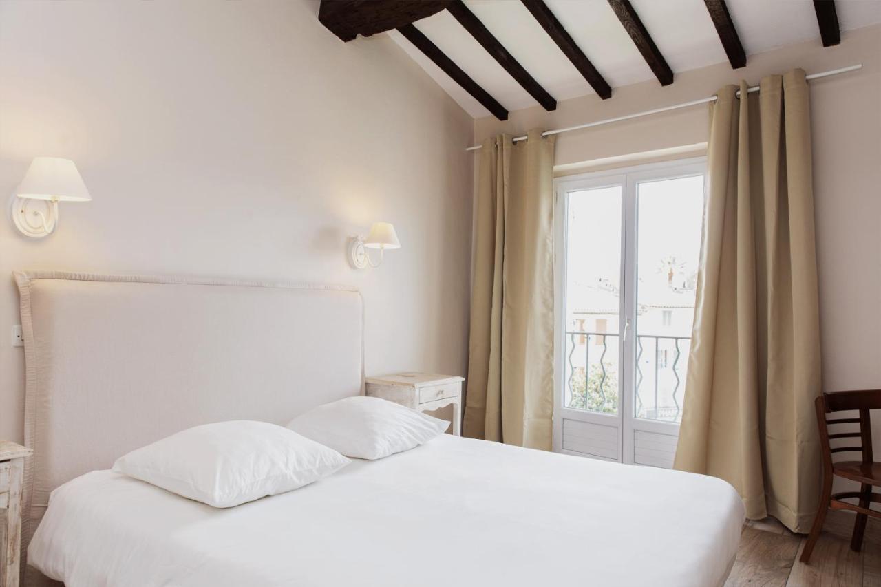 Coq Hotel Cogolin Bagian luar foto