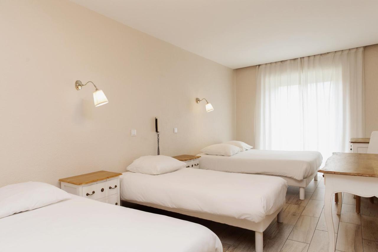Coq Hotel Cogolin Bagian luar foto