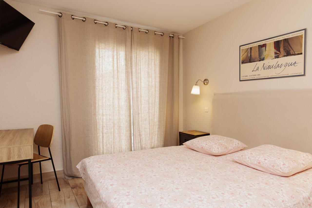 Coq Hotel Cogolin Bagian luar foto