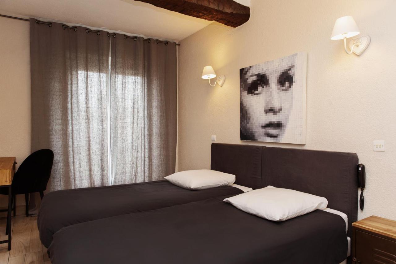 Coq Hotel Cogolin Bagian luar foto