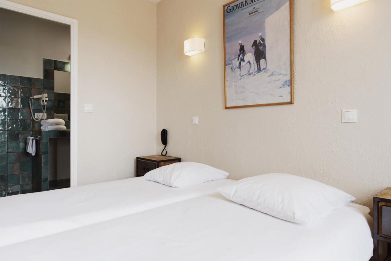Coq Hotel Cogolin Bagian luar foto
